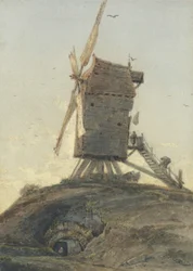 Windmühle auf einem Hügel in einer Landschaft